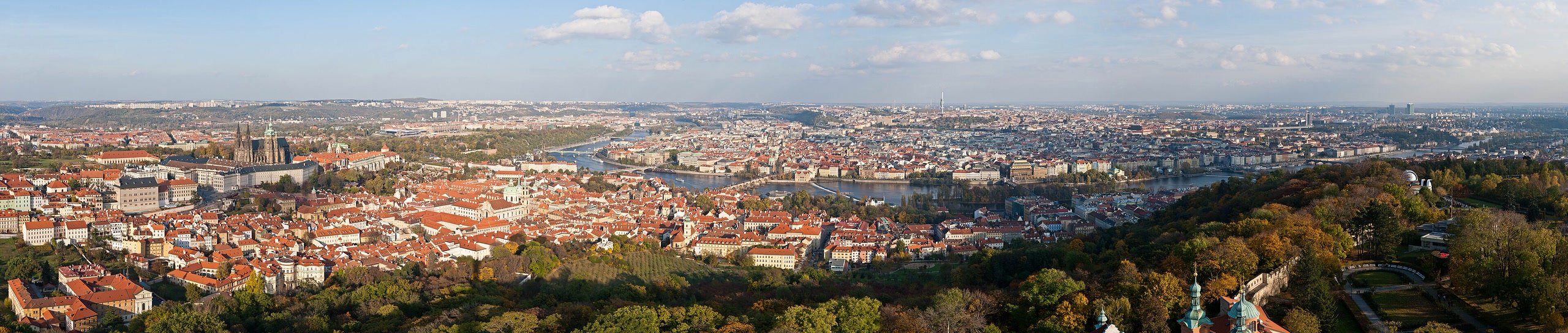 Prague’s historic skyline and red rooftops viewed across the Vltava valley