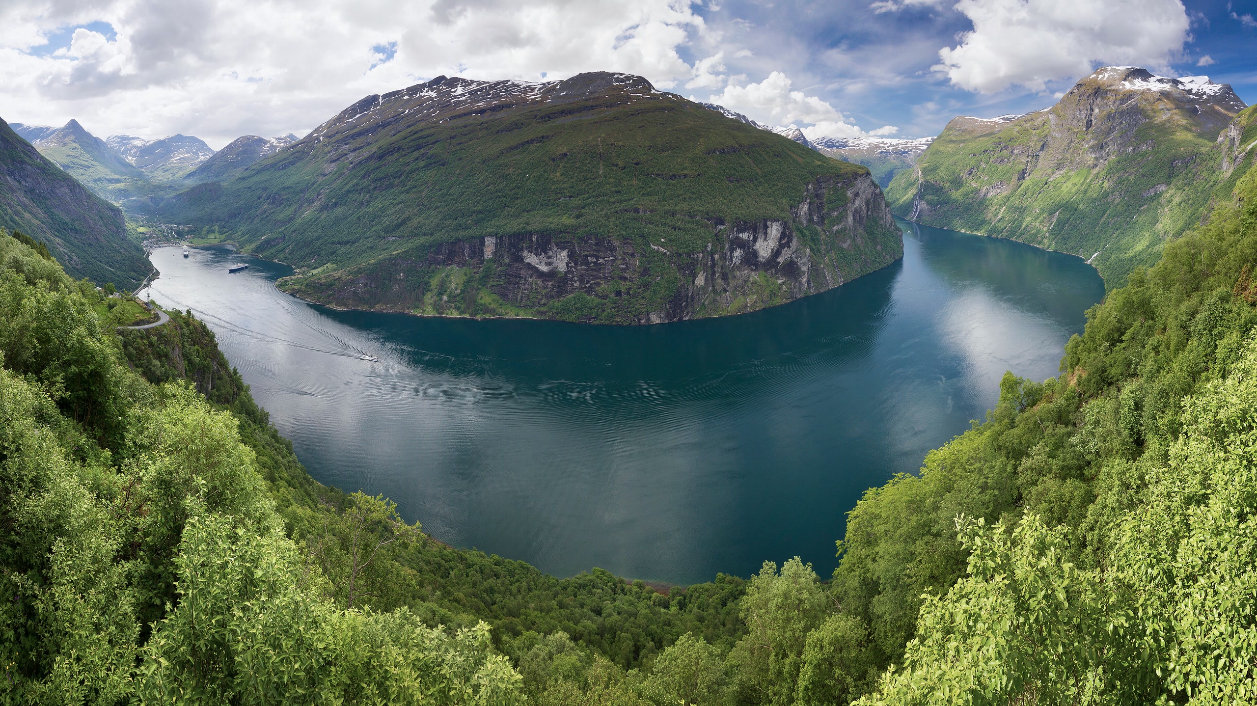 Geirangerfjord viewed between steep green mountains from Ørnesvingen