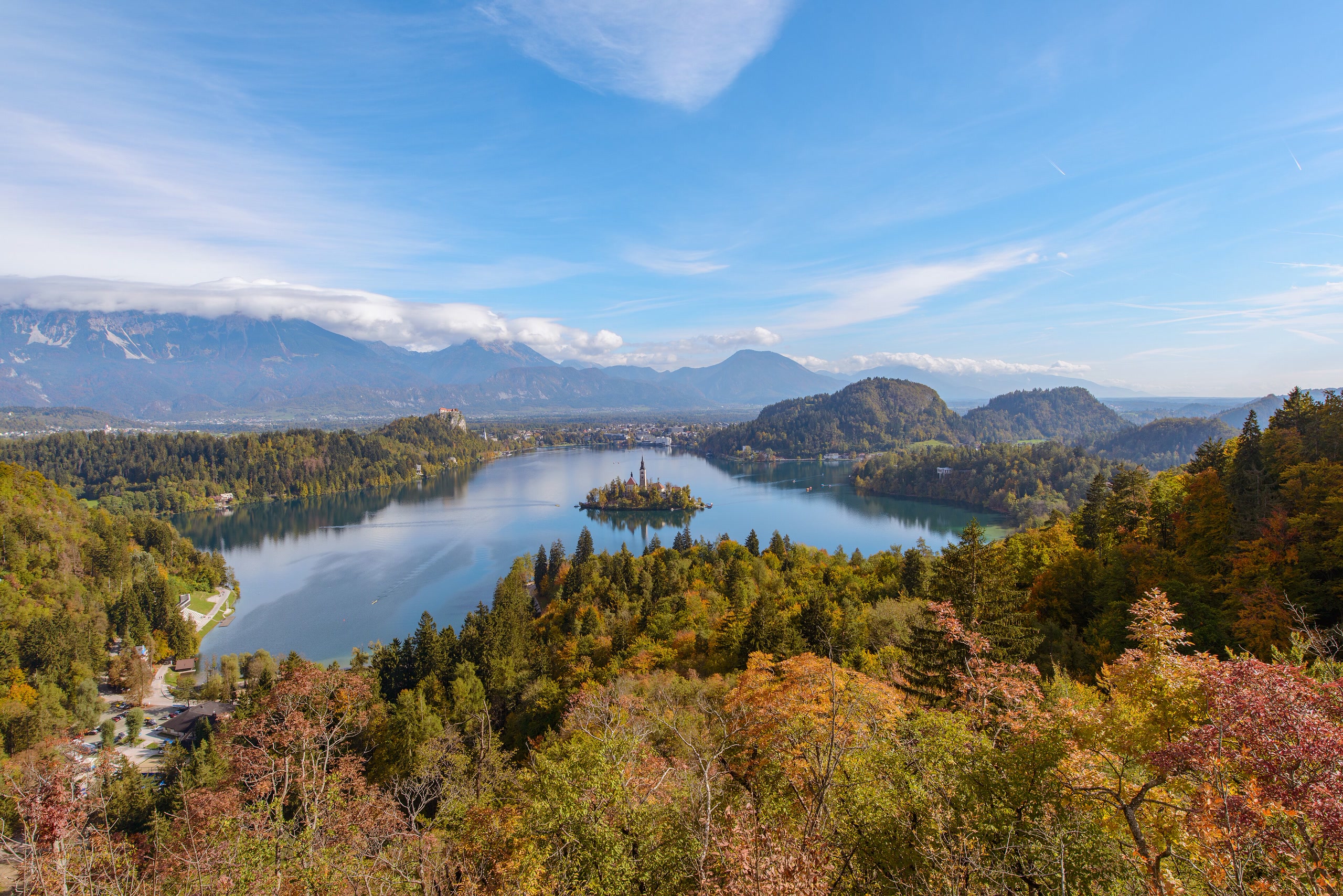 Lake Bled, its island church, and the Julian Alps in autumn